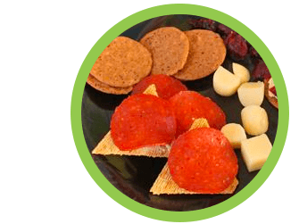 Babybel Mozzarella Cheese, pepperoni slices and cherry tomato halves