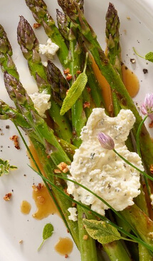 Roasted asparagus topped with cheese