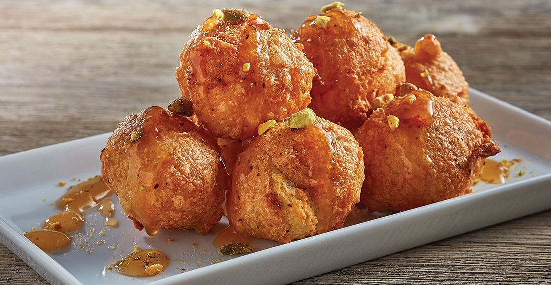 Black Pepper Beignets with Honey-Chile Glaze & Boursin Cheese